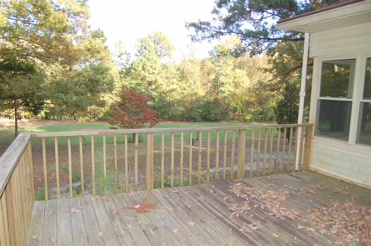 409 Goodwin Road Durham, NC 27712 - Photo 21 of 25 Deck off the Sunroom overlooks Field