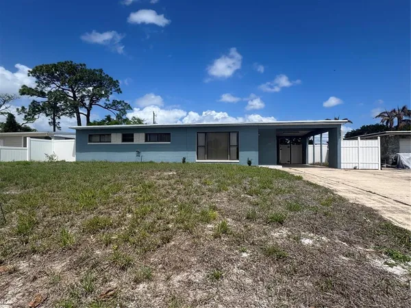 a view of a house with a swimming pool