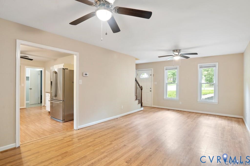 4001 London Road Hopewell, VA 23860 - Photo 4 of 8 a view of an empty room with window and wooden floor