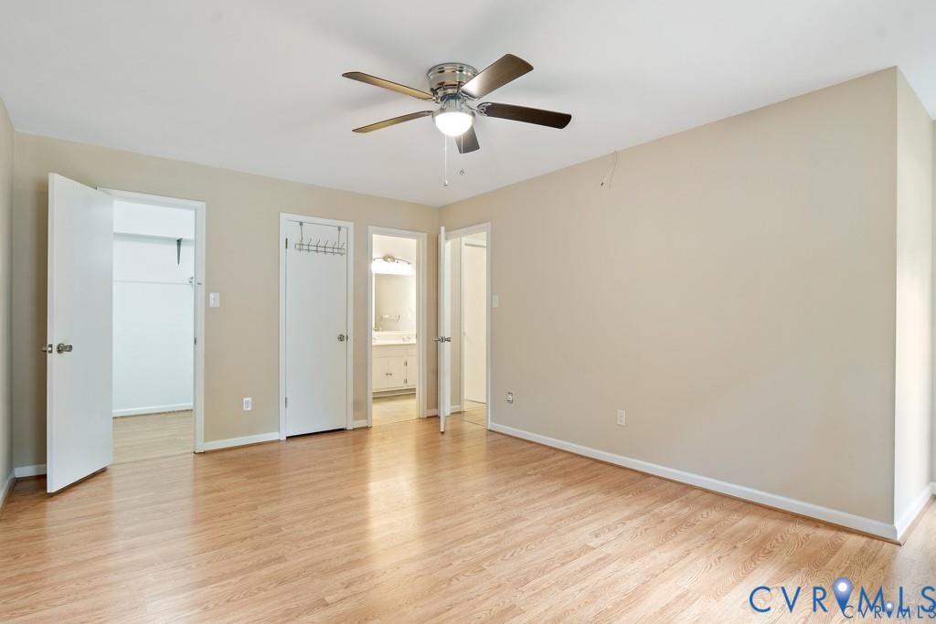 4001 London Road Hopewell, VA 23860 - Photo 8 of 8 an empty room with wooden floor and ceiling fan