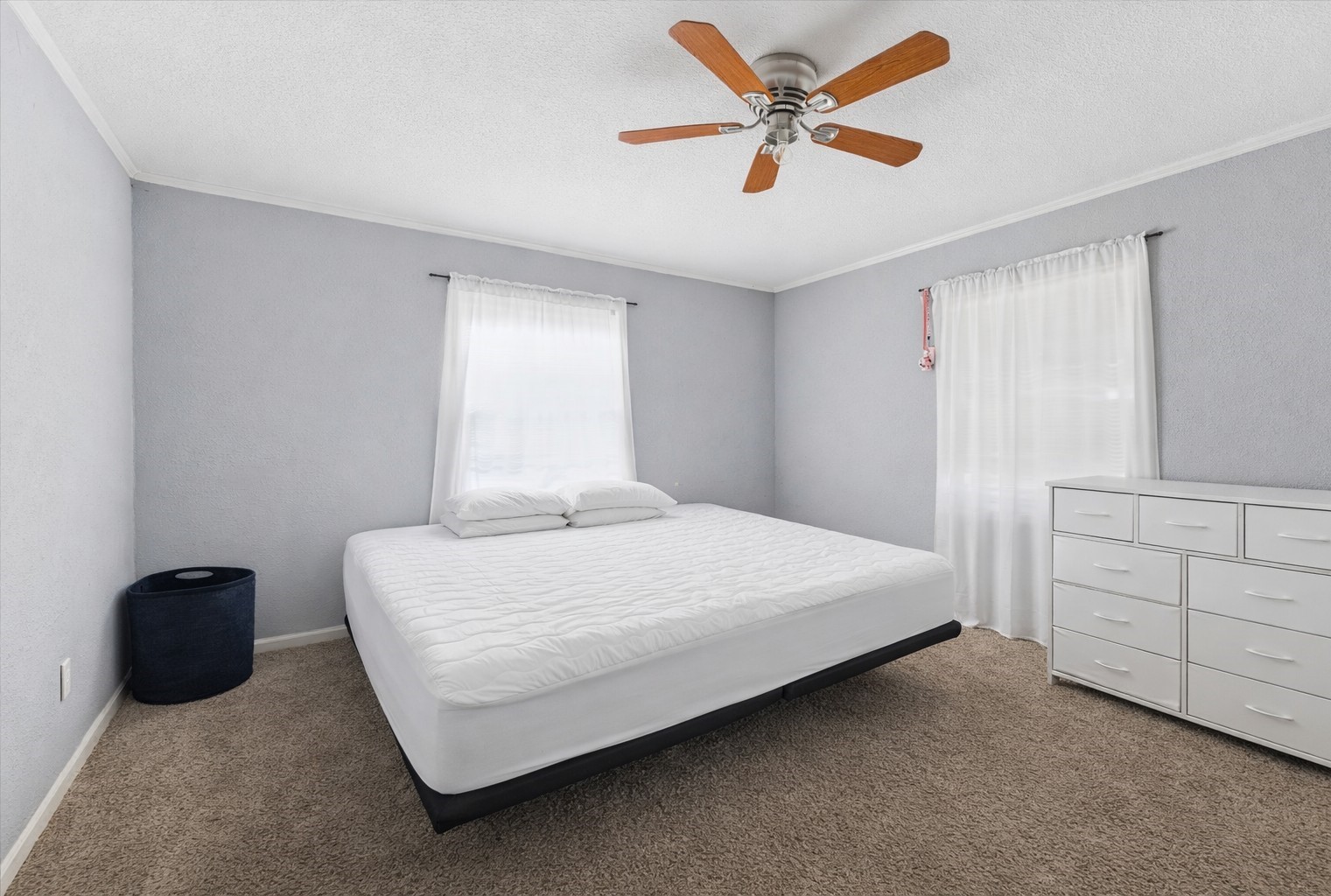 1435 Demaree Lane Houston, TX 77029 - Photo 5 of 10 a bedroom with a bed and a cabinets