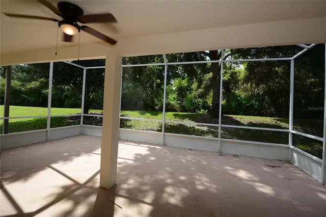 a view of a house with backyard from a tub