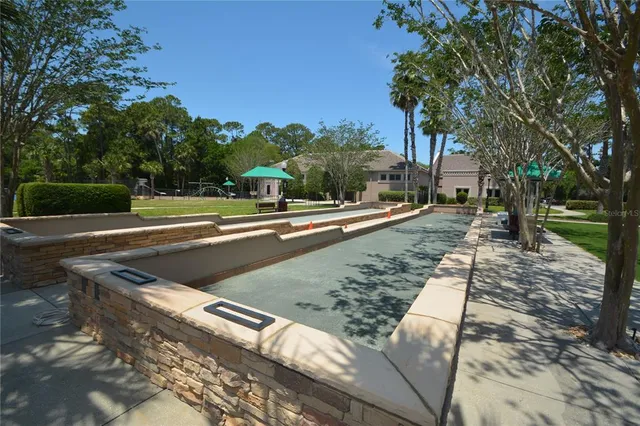 a view of a bench in a backyard