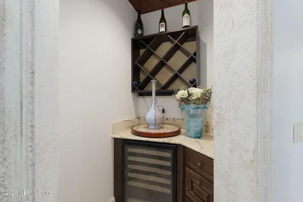 a view of a hallway with washer and dryer