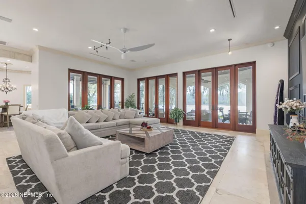 a view of entryway livingroom and hall