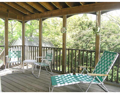 111 Robbins Road Arlington, MA 02476 - Photo 3 of 18 a view of a chairs and table in patio