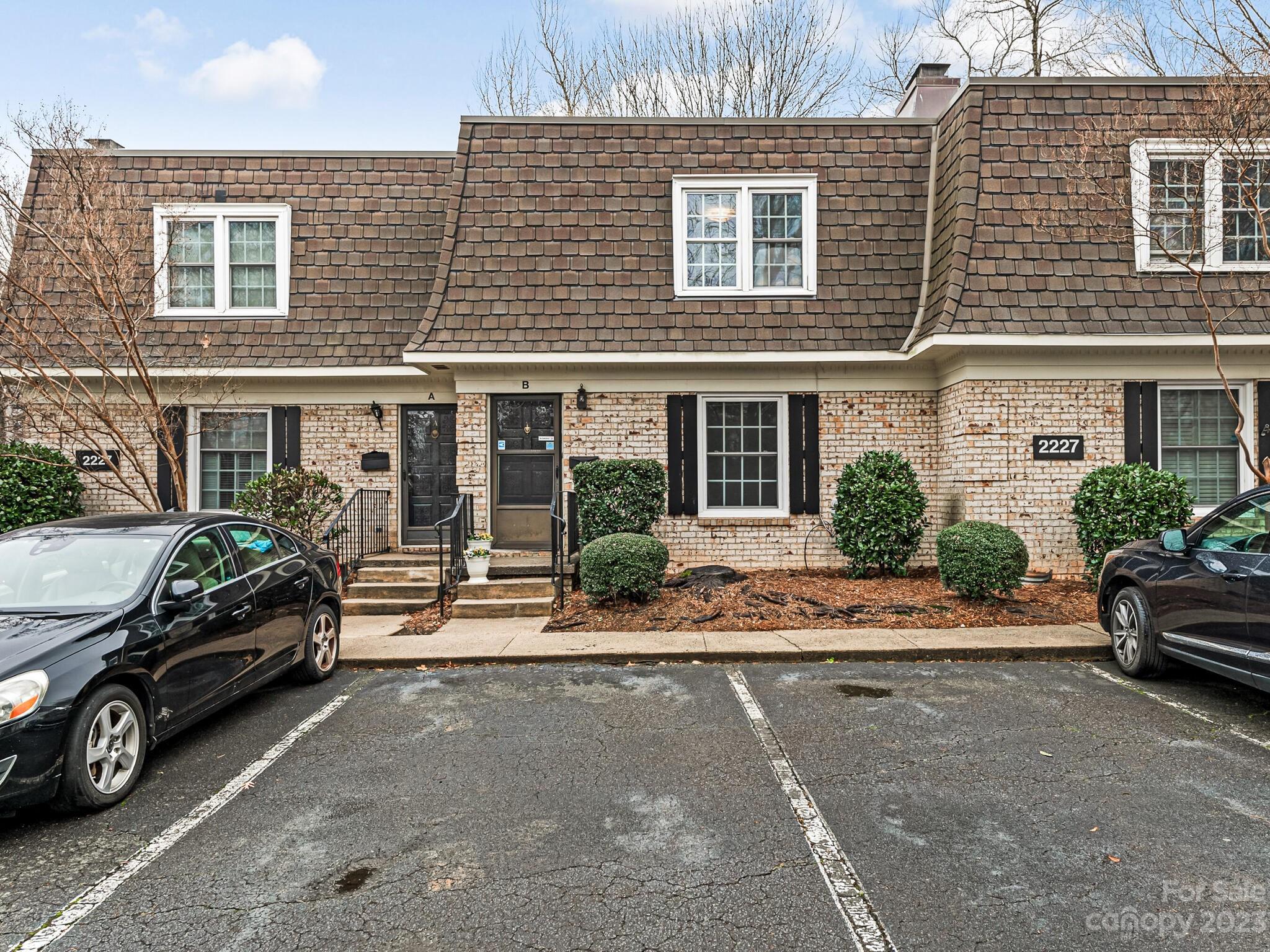 2227 Rexford Road, Unit B Charlotte, NC 28211 - Photo 1 of 23 a view of a car parked in front of a house