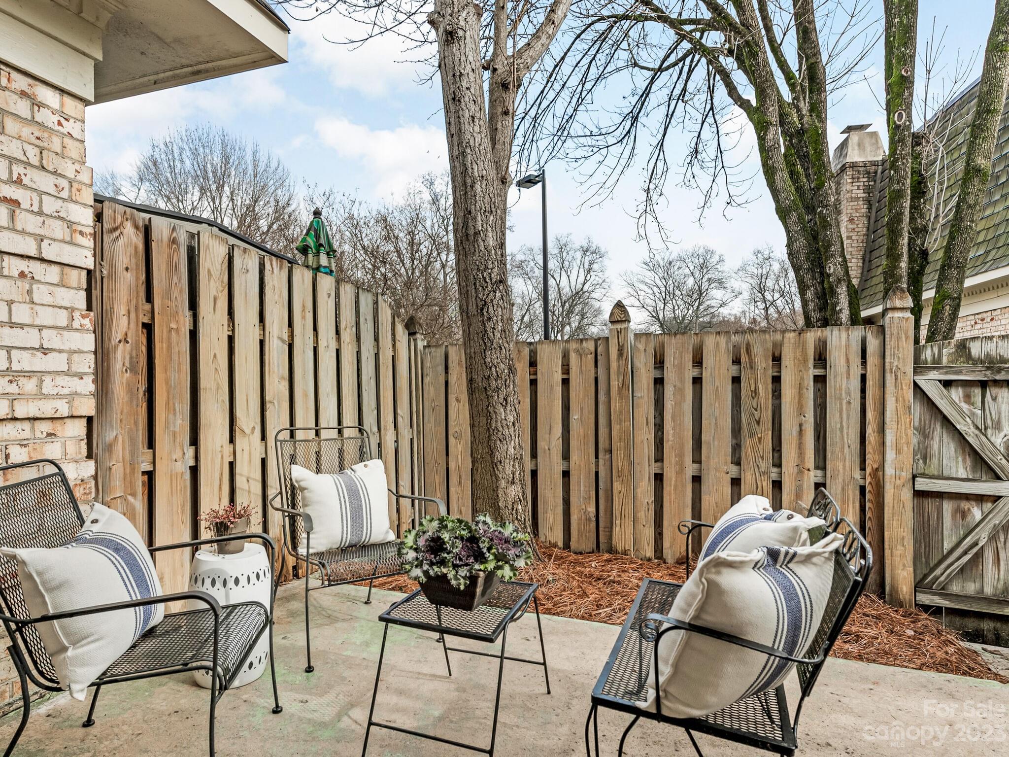 2227 Rexford Road, Unit B Charlotte, NC 28211 - Photo 17 of 23 a view of a chairs and tables in the balcony