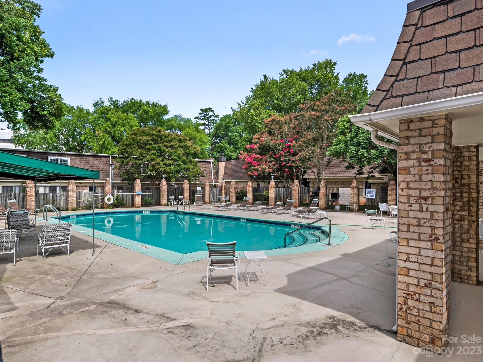 2227 Rexford Road, Unit B Charlotte, NC 28211 - Photo 19 of 23 a view of a house with a yard and sitting area