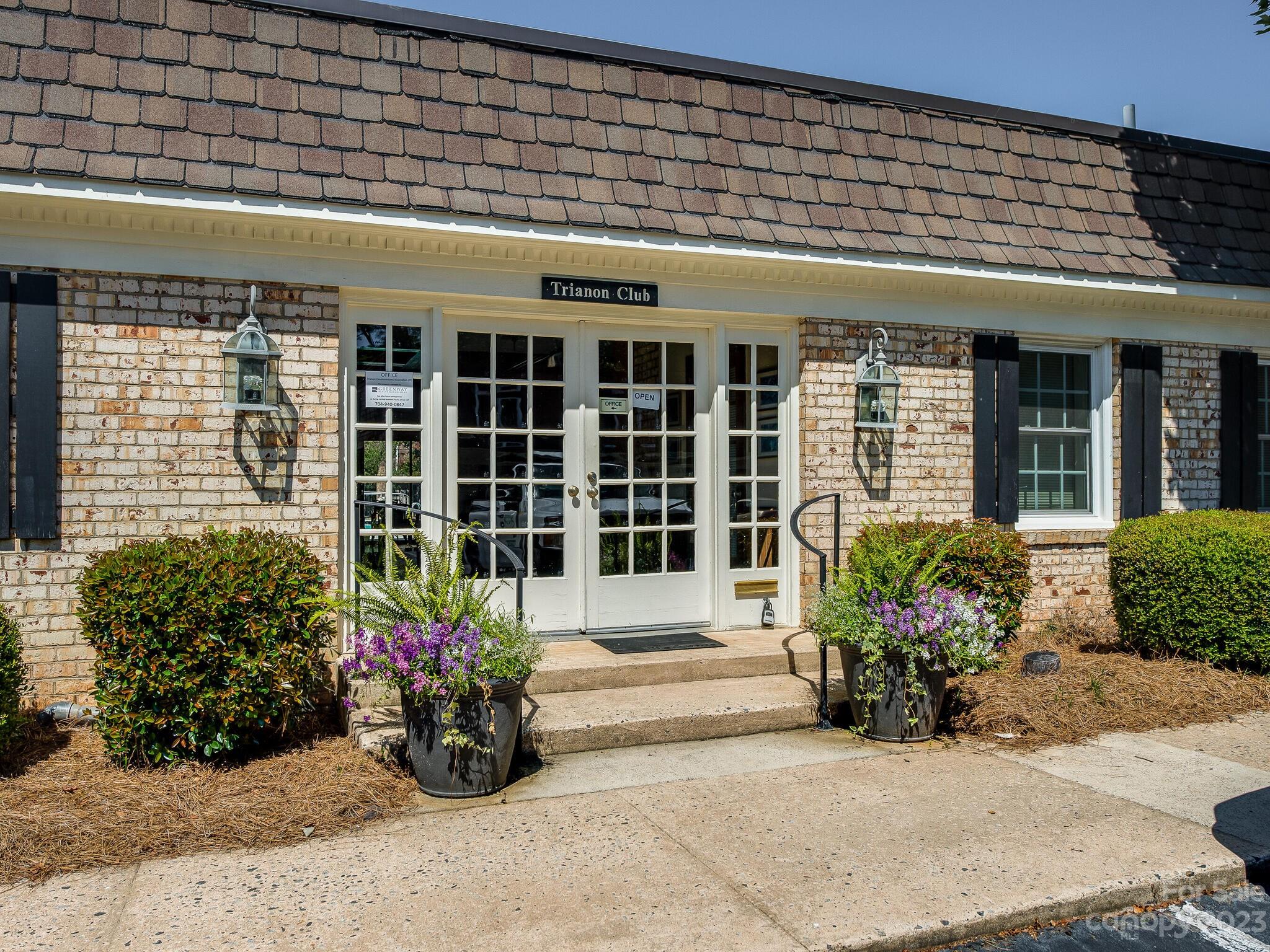 2227 Rexford Road, Unit B Charlotte, NC 28211 - Photo 20 of 23 front view of a building with potted plants