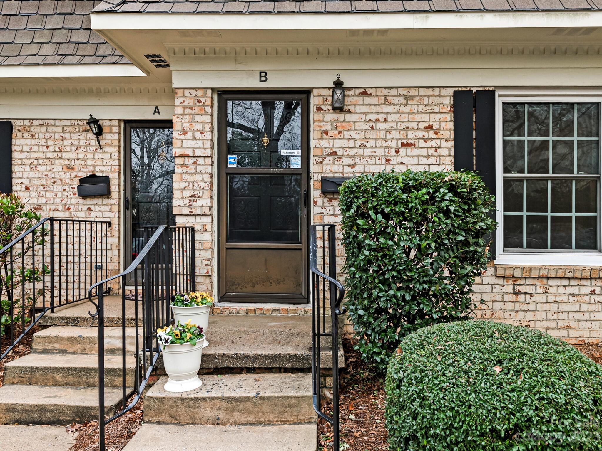 2227 Rexford Road, Unit B Charlotte, NC 28211 - Photo 2 of 23 a front view of a house with a window
