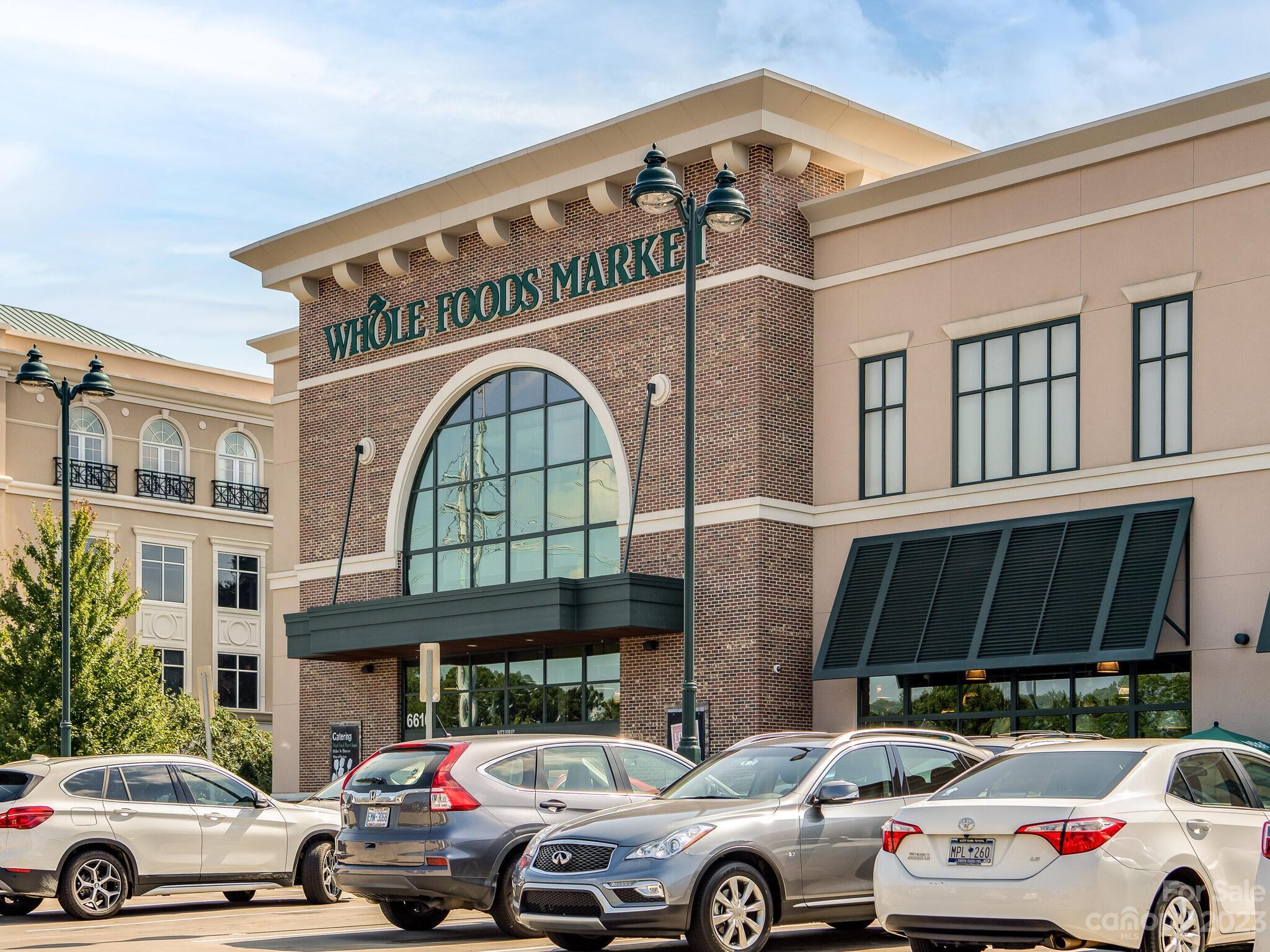2227 Rexford Road, Unit B Charlotte, NC 28211 - Photo 21 of 23 a front view of a building with parking space