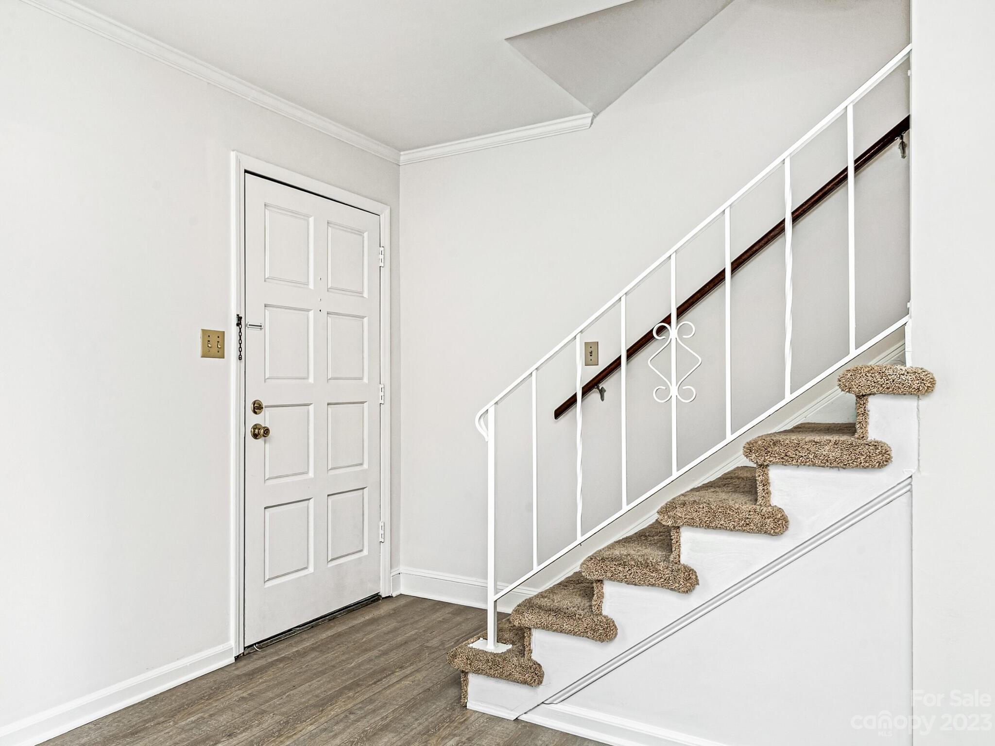2227 Rexford Road, Unit B Charlotte, NC 28211 - Photo 3 of 23 a view of entryway with wooden floor