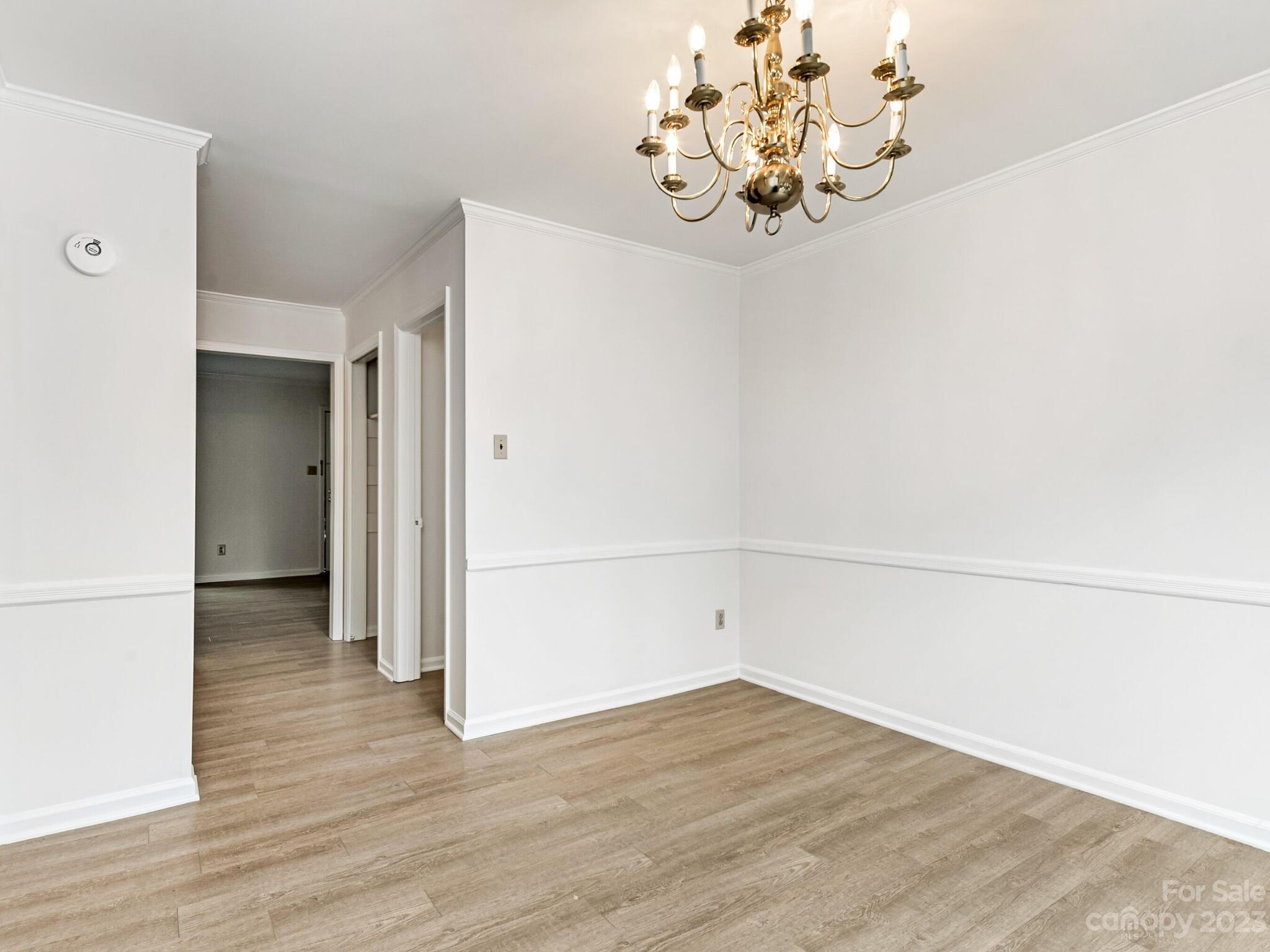 2227 Rexford Road, Unit B Charlotte, NC 28211 - Photo 7 of 23 a view of a room with wooden floor