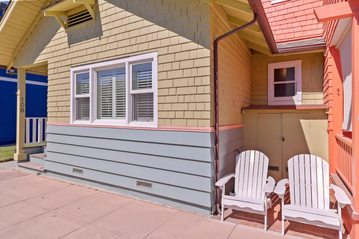 106 Lawn Way Capitola, CA 95010 - Photo 20 of 21 a view of a chair and table in the back yard