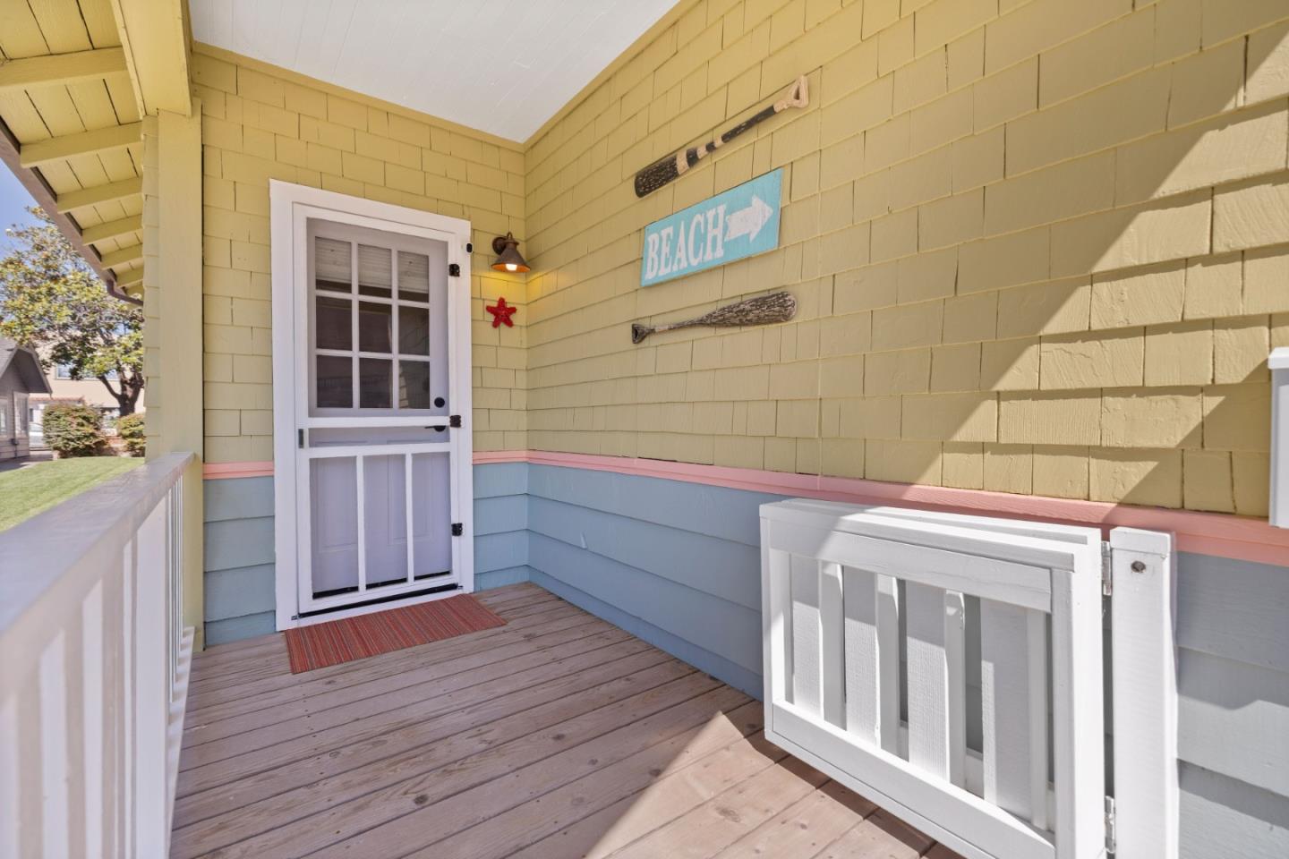 106 Lawn Way Capitola, CA 95010 - Photo 2 of 21 a view of a house with a deck