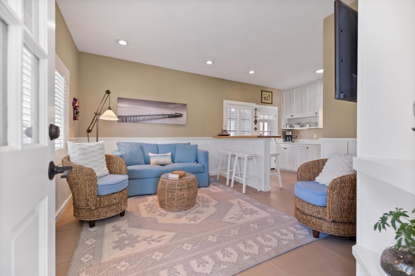 106 Lawn Way Capitola, CA 95010 - Photo 6 of 21 a living room with furniture and a large window