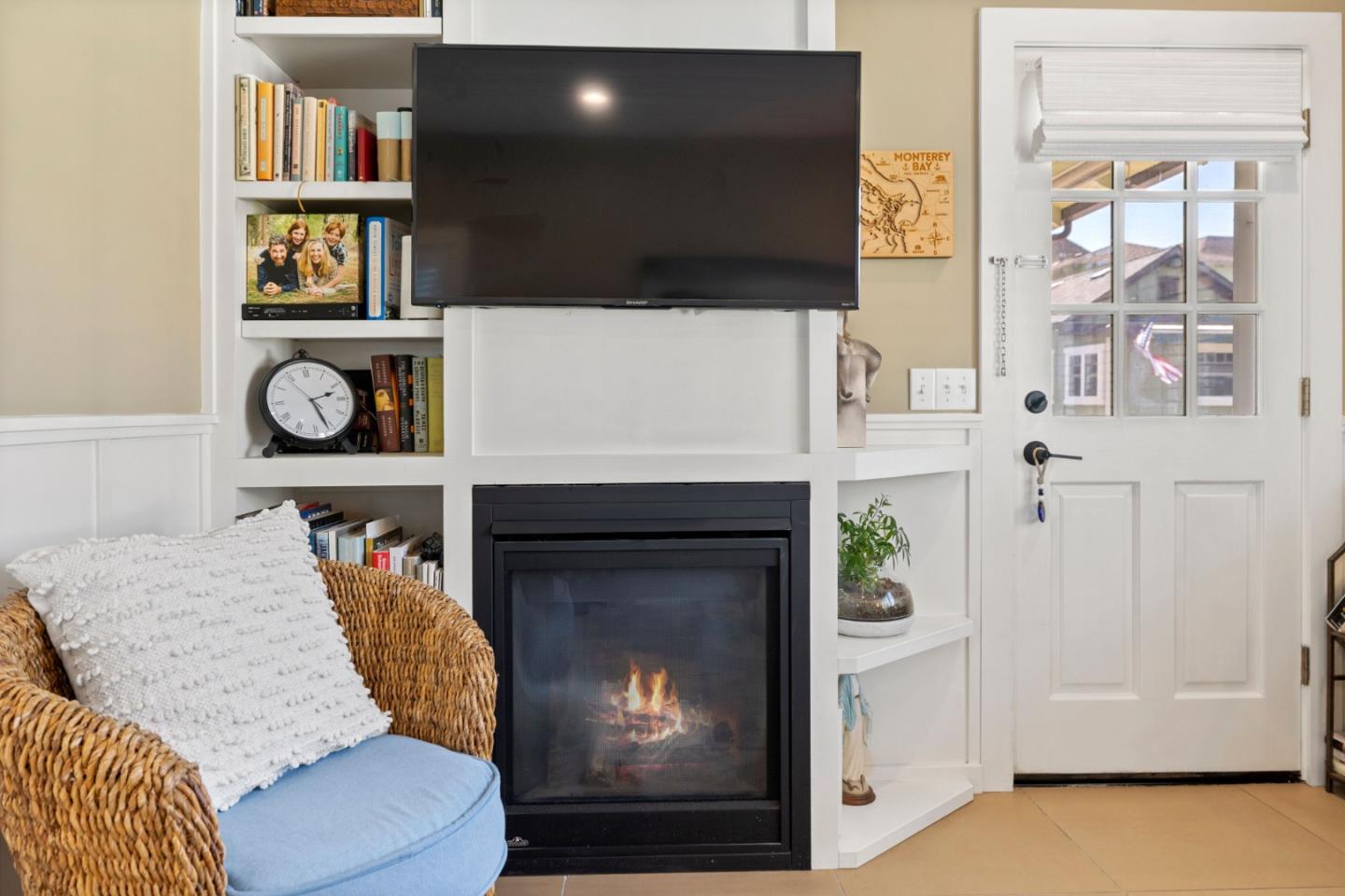 106 Lawn Way Capitola, CA 95010 - Photo 10 of 21 a living room with furniture and a fireplace