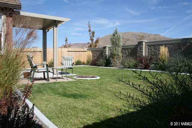 9280 Lost Valley Road Reno, NV 89521 - Photo 12 of 13 a view of a house with backyard porch and sitting area