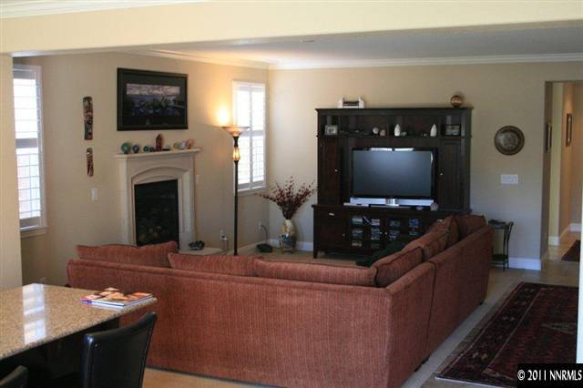 9280 Lost Valley Road Reno, NV 89521 - Photo 5 of 13 a living room with furniture and a flat screen tv