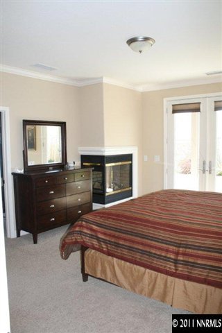 9280 Lost Valley Road Reno, NV 89521 - Photo 6 of 13 a bedroom with a bed and a dresser