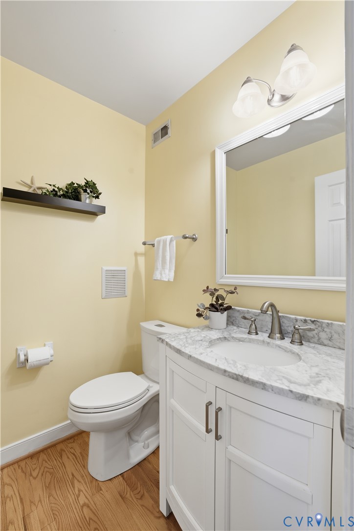 6104 Lansgate Road Midlothian, VA 23112 - Photo 18 of 42 Hall Half Bath with updated Vanity