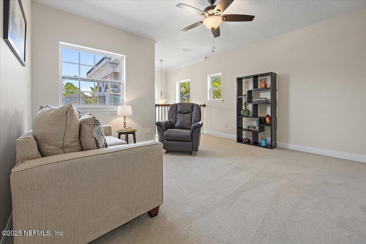 166 Portside Avenue Ponte Vedra, FL 32081 - Photo 18 of 46 a living room with furniture and a window