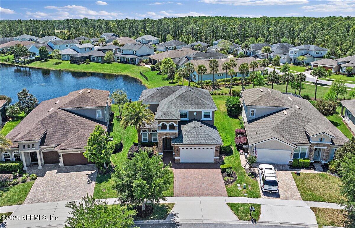166 Portside Avenue Ponte Vedra, FL 32081 - Photo 3 of 46 an aerial view of a house with a lake view