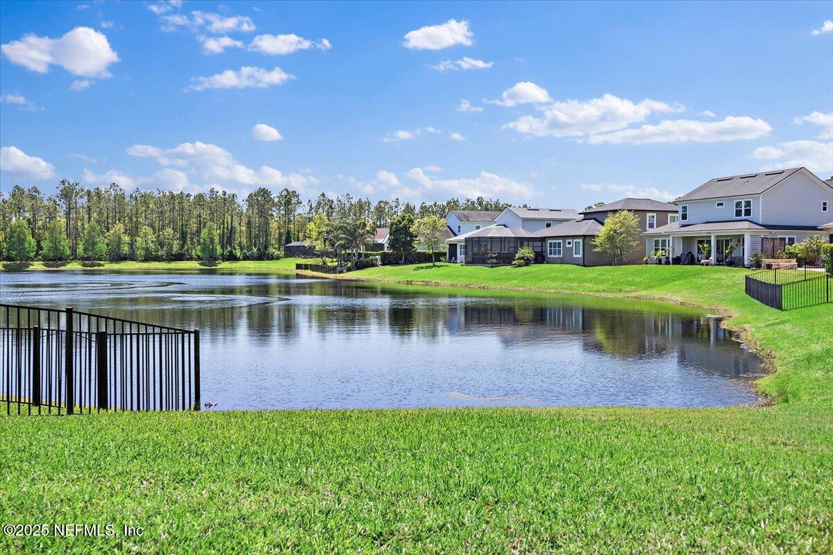166 Portside Avenue Ponte Vedra, FL 32081 - Photo 34 of 46 a view of a lake with a yard