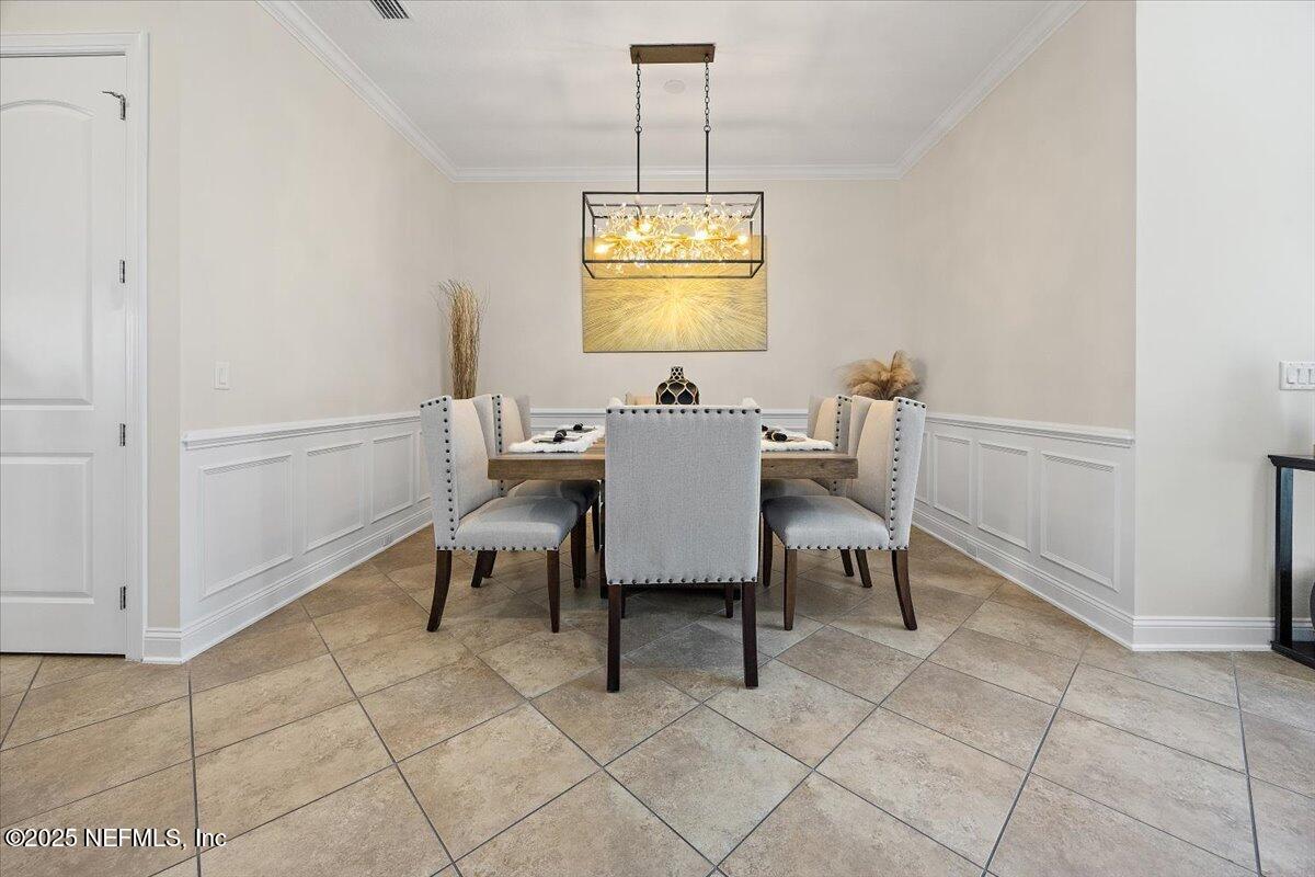 166 Portside Avenue Ponte Vedra, FL 32081 - Photo 7 of 46 a dining room with furniture and window