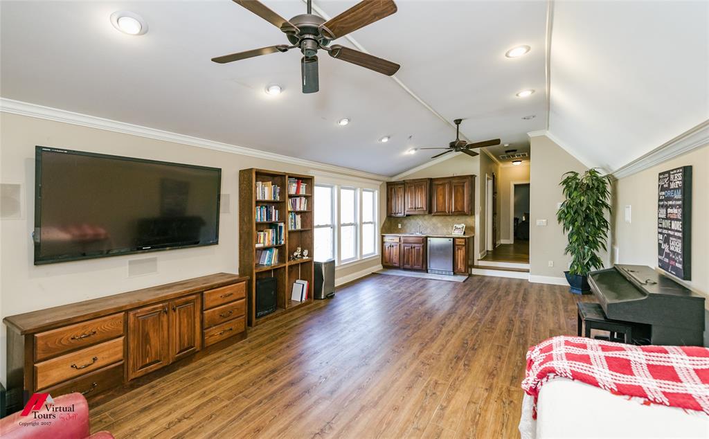 5180 Linton Cutoff Road Benton, LA 71006 - Photo 30 of 40 a living room with furniture and a flat screen tv