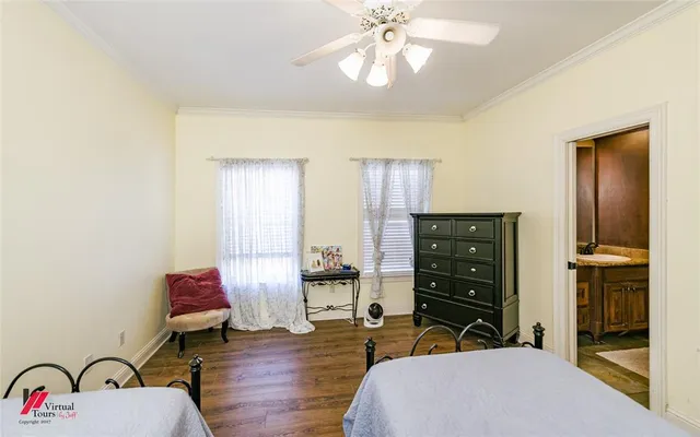 a bedroom with a bed and furniture