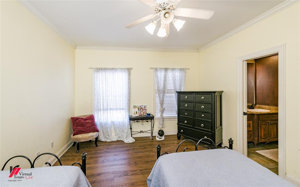 5180 Linton Cutoff Road Benton, LA 71006 - Photo 31 of 40 a bedroom with a bed and furniture
