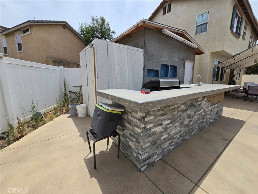 1315 Plaza Way Perris, CA 92570 - Photo 30 of 37 a view of a house with backyard and sitting area