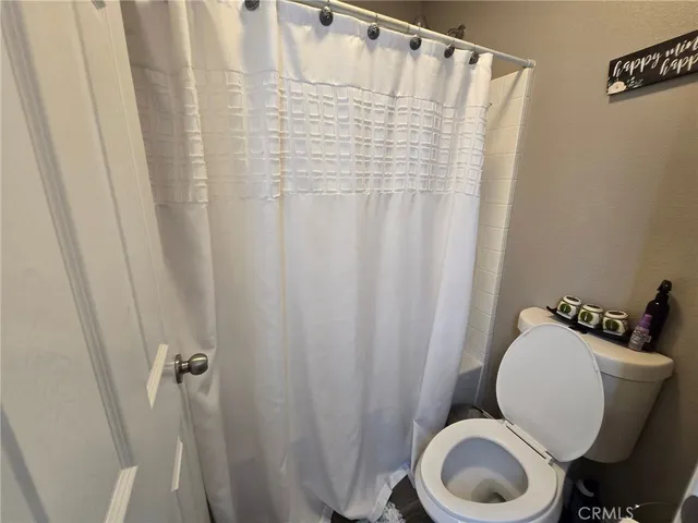 a view of a backyard with sitting area