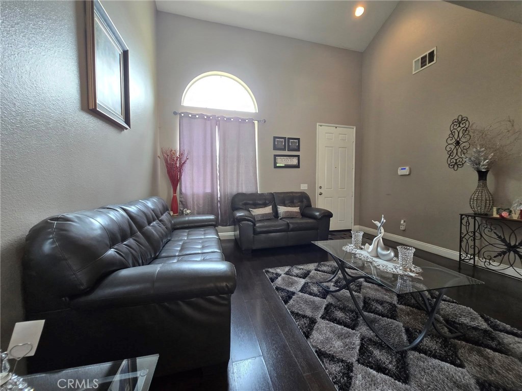 1315 Plaza Way Perris, CA 92570 - Photo 6 of 37 a living room with furniture and wooden floor