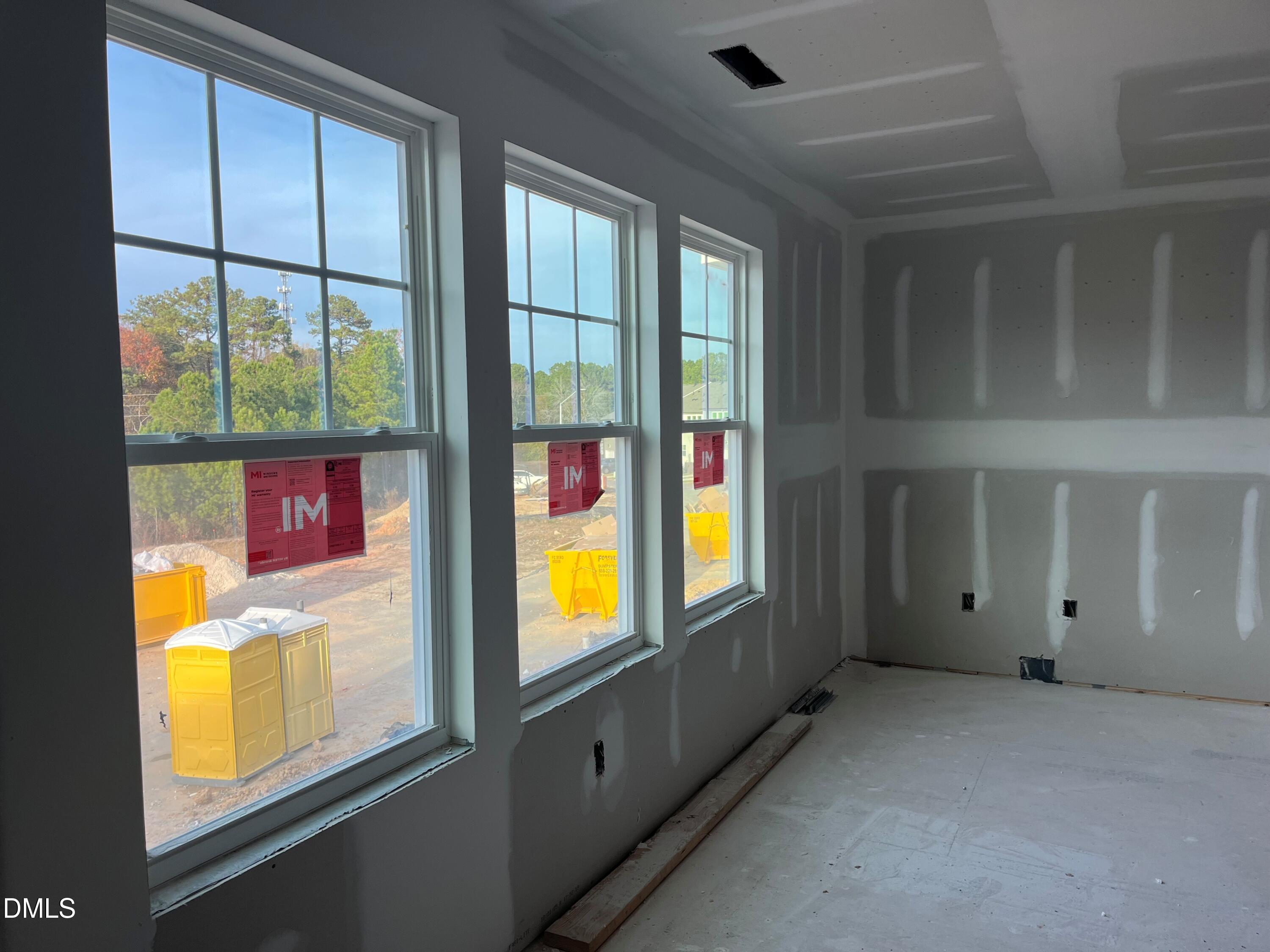 6423 Granite Quarry Drive Raleigh, NC 27610 - Photo 11 of 49 a view of an empty room with a window
