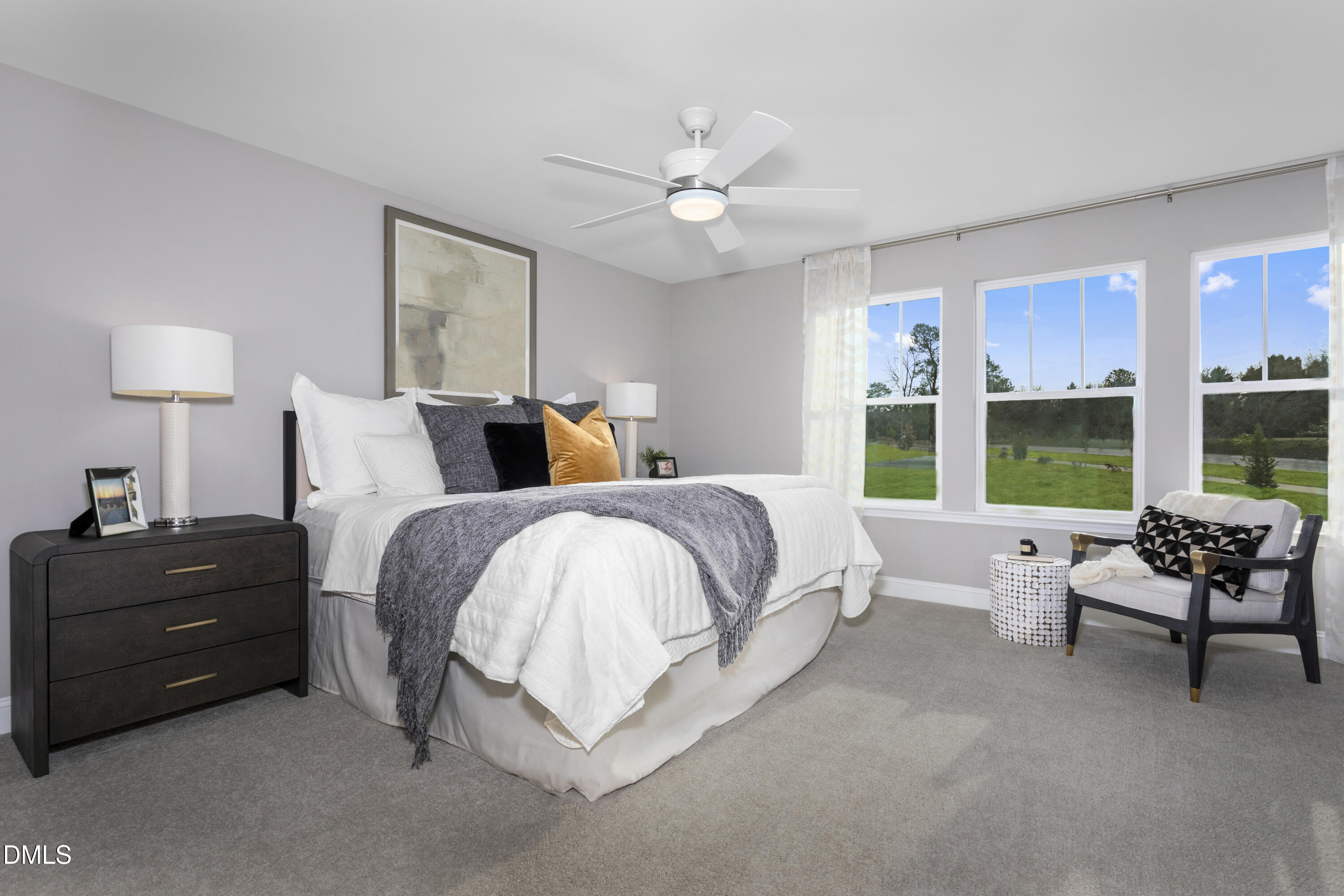 6423 Granite Quarry Drive Raleigh, NC 27610 - Photo 23 of 49 a spacious bedroom with a bed and a couch