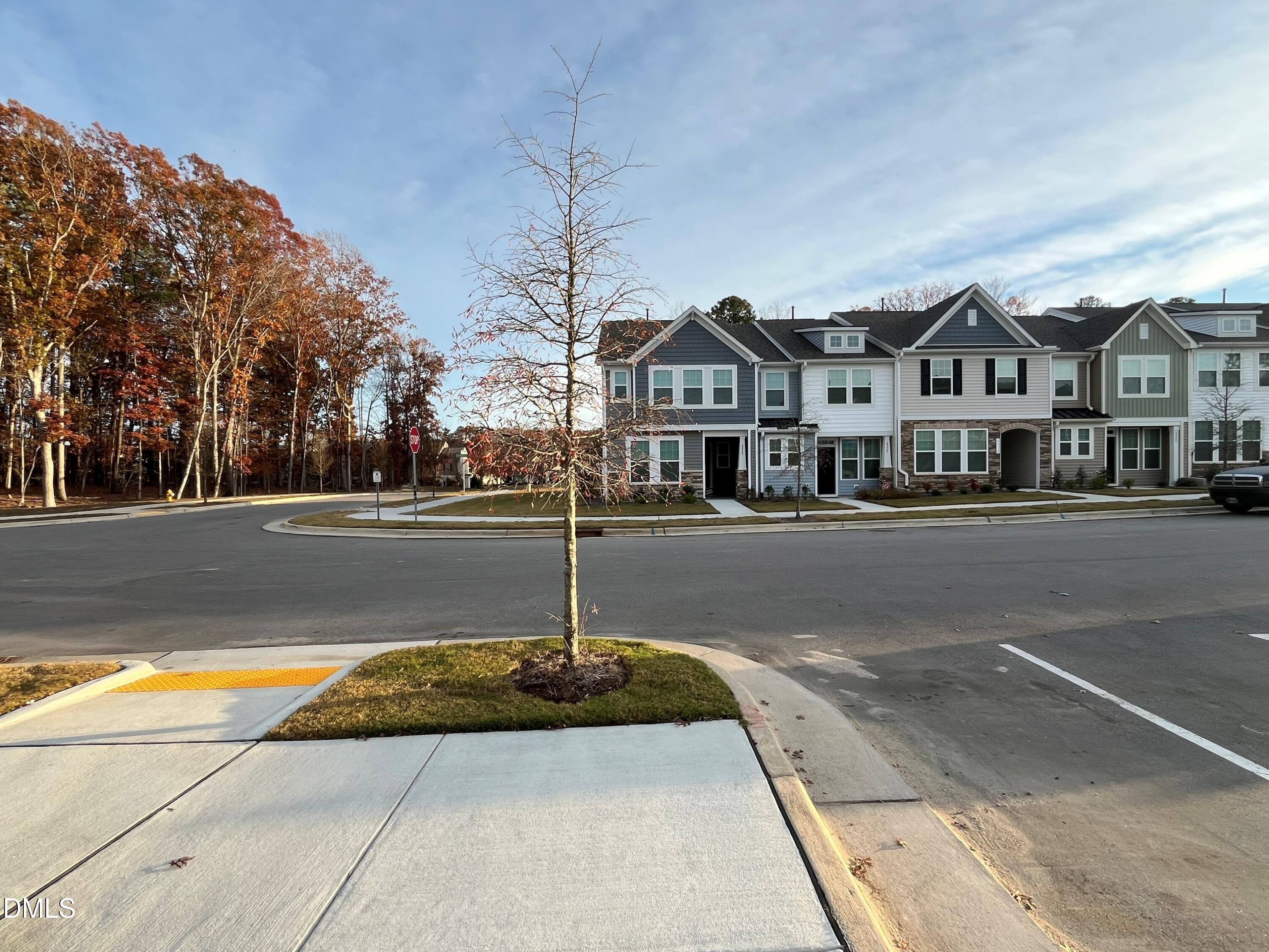 6423 Granite Quarry Drive Raleigh, NC 27610 - Photo 27 of 49 a front view of a building with street view