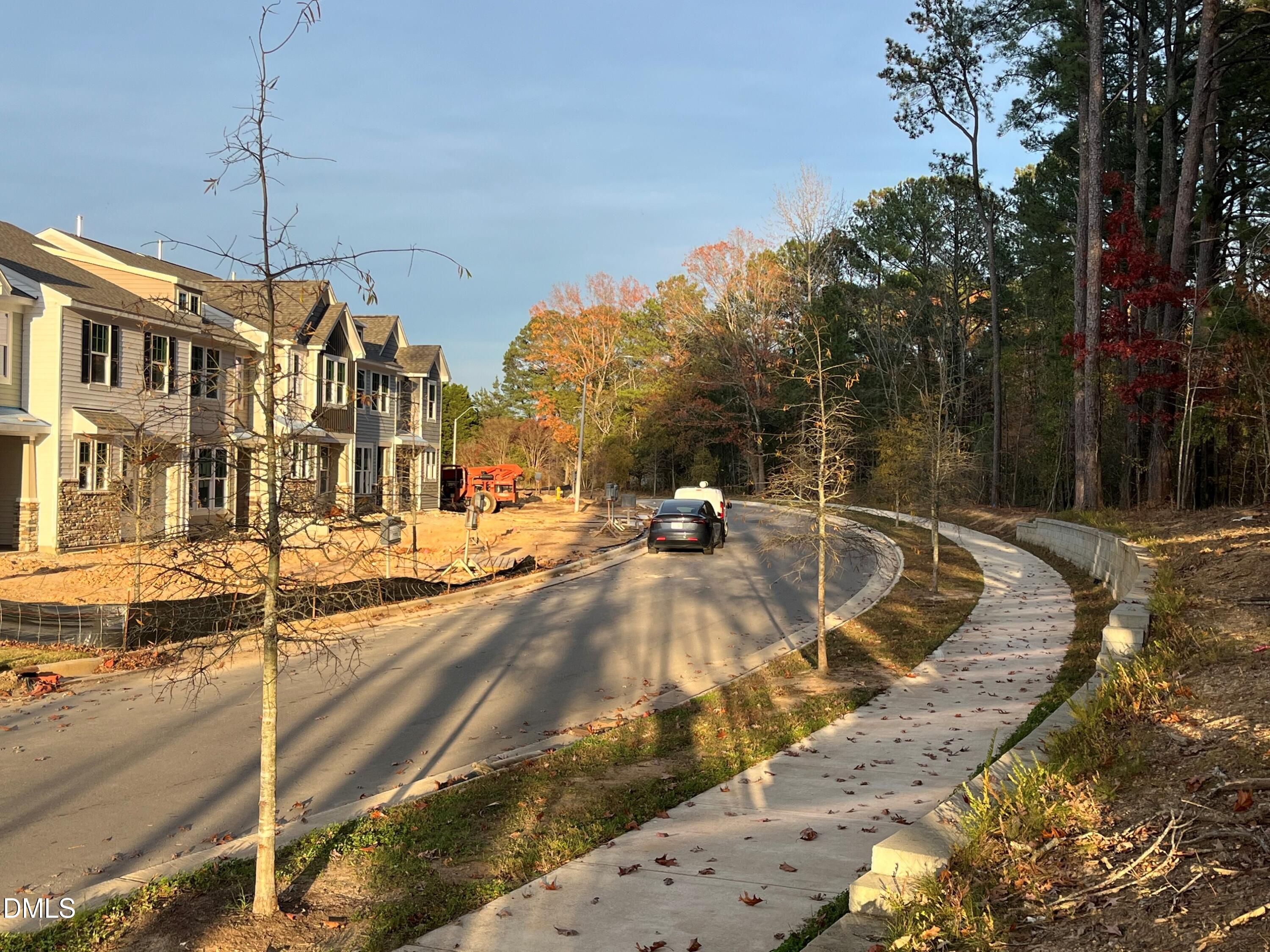 6423 Granite Quarry Drive Raleigh, NC 27610 - Photo 29 of 49 a view of a swimming pool with a patio