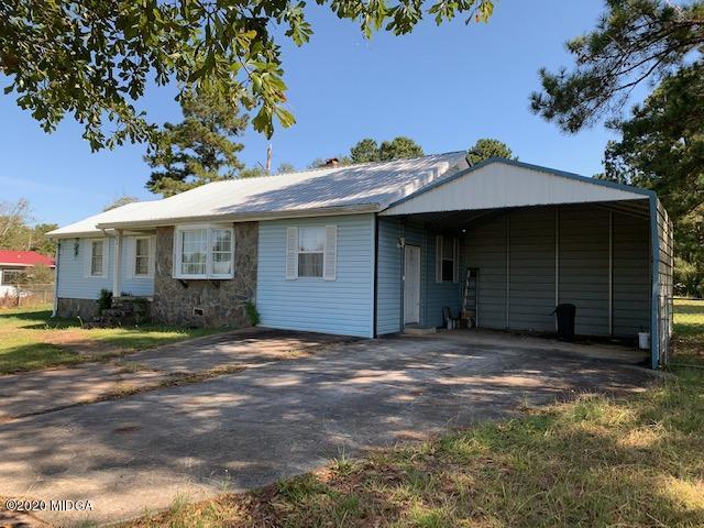 747 Gose Road Forsyth, GA 31029 - Photo 2 of 15 a view of a house with a yard