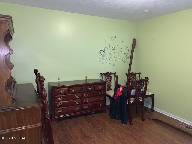 747 Gose Road Forsyth, GA 31029 - Photo 11 of 15 a view of a workspace with furniture