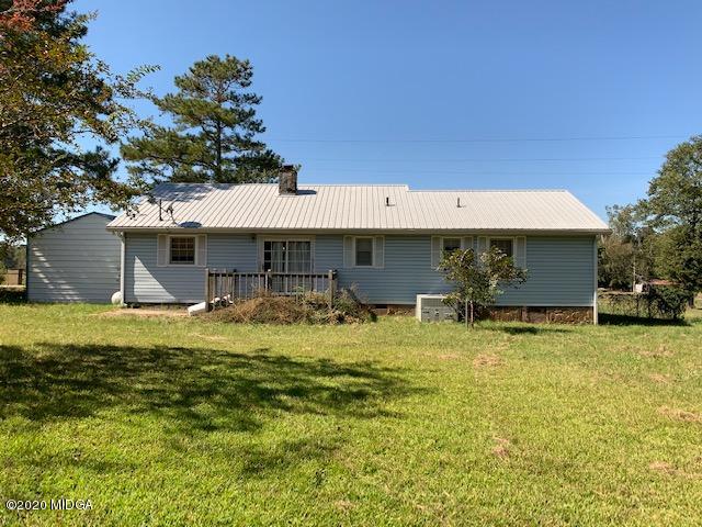 747 Gose Road Forsyth, GA 31029 - Photo 14 of 15 a view of a house with swimming pool
