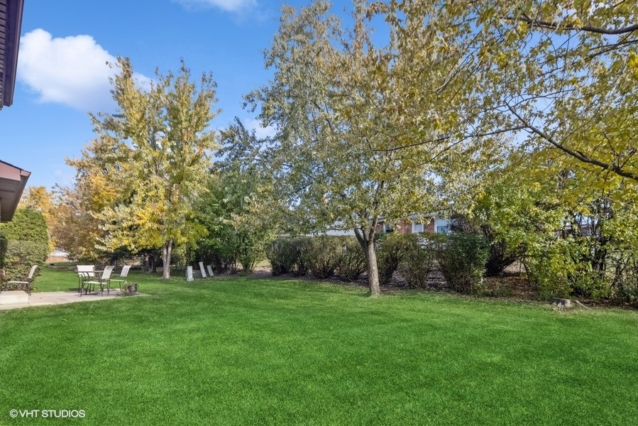 7631 Apple Tree Lane Willowbrook, IL 60527 - Photo 3 of 24 a view of a park with large trees