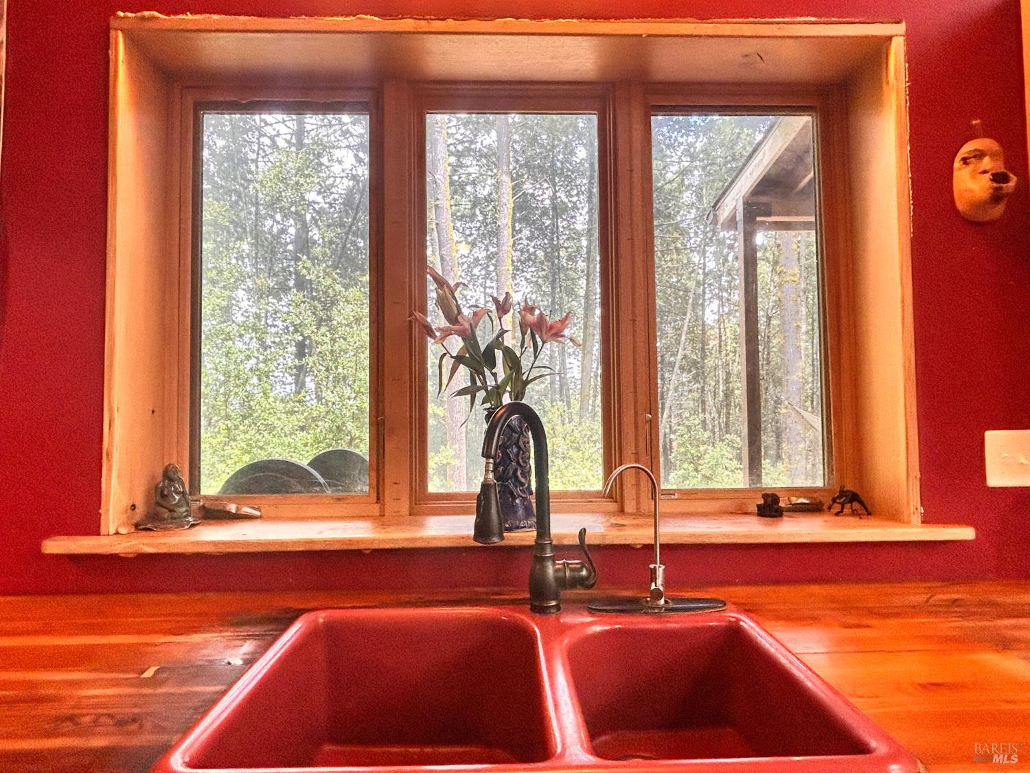 29281 Timberline Road Willits, CA 95490 - Photo 18 of 38 a bathroom with a tub and large windows