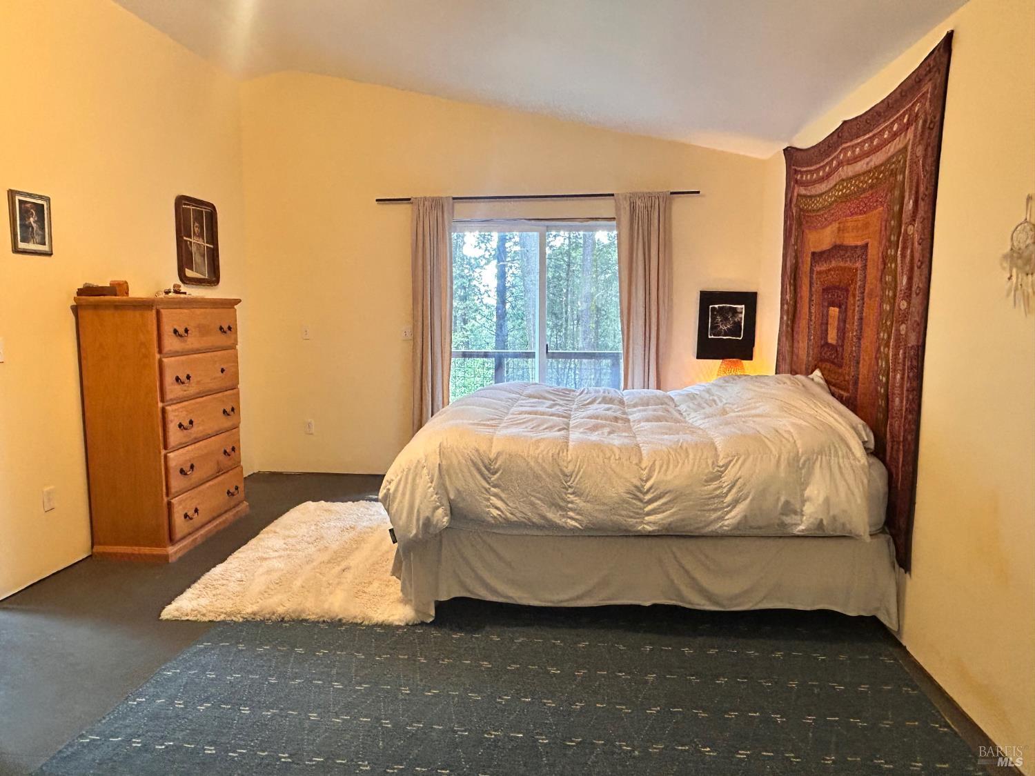 29281 Timberline Road Willits, CA 95490 - Photo 23 of 38 a bedroom with a bed and dresser