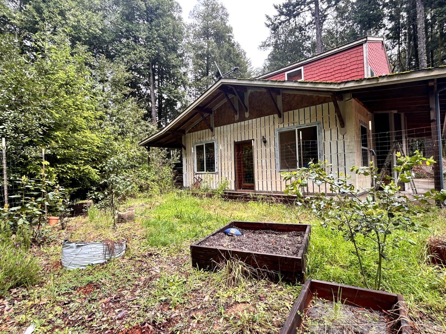 29281 Timberline Road Willits, CA 95490 - Photo 34 of 38 a front view of a house with garden