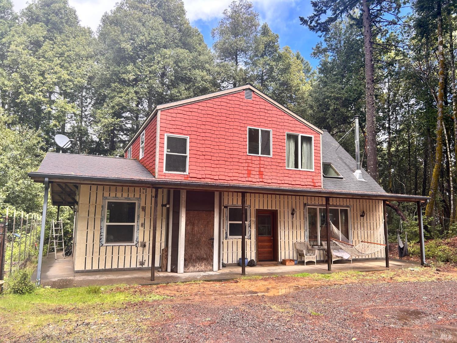 29281 Timberline Road Willits, CA 95490 - Photo 4 of 38 a front view of a house with a garden