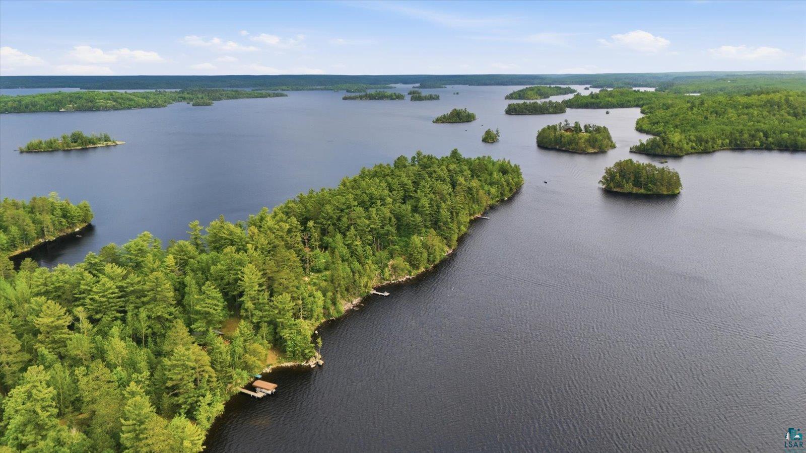 5298 Long Island Tower, MN 55790 - Photo 18 of 31 Expansive waterfront property featuring dense, mature tree coverage along the shoreline