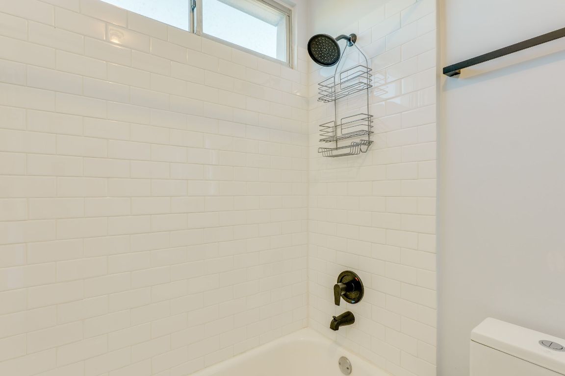 4801 South Congress Avenue, Unit S3 Austin, TX 78745 - Photo 14 of 40 a bathroom with a shower